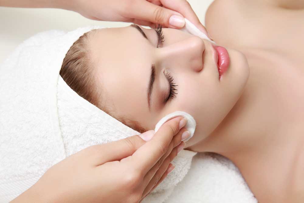 Woman undergoing a facial treatment